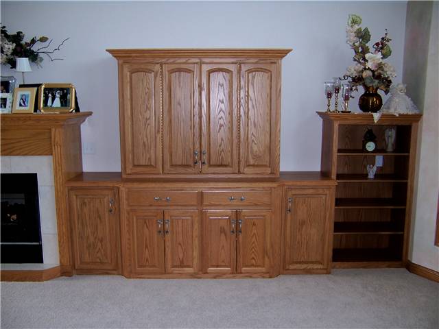 Home theater - stained oak - with bifold pocket doors